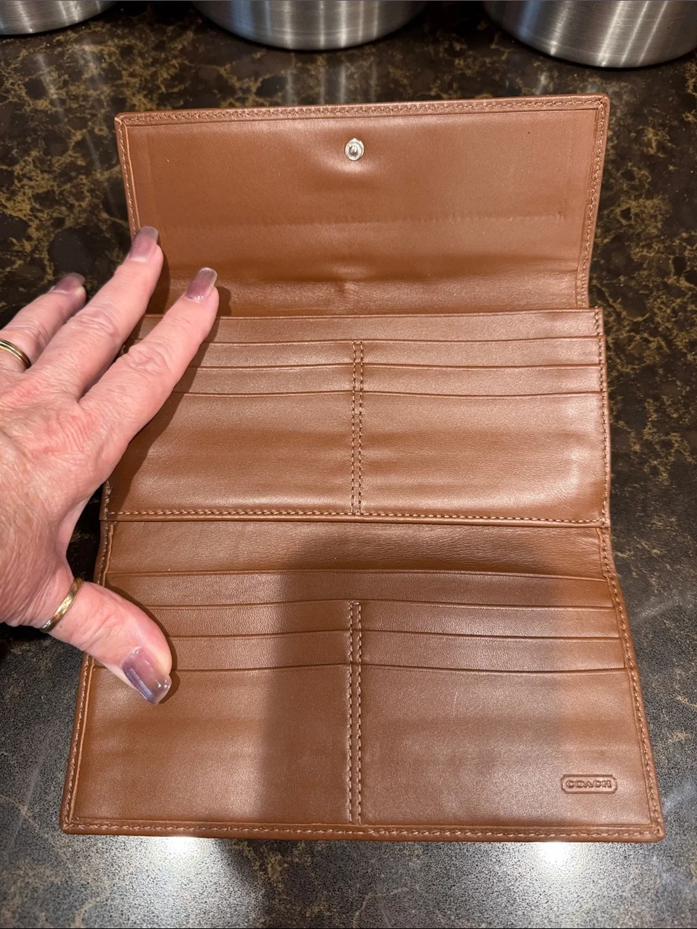 Coach Tan Signature “C” Canvas trifold Wallet with Brown Leather Trim embossed